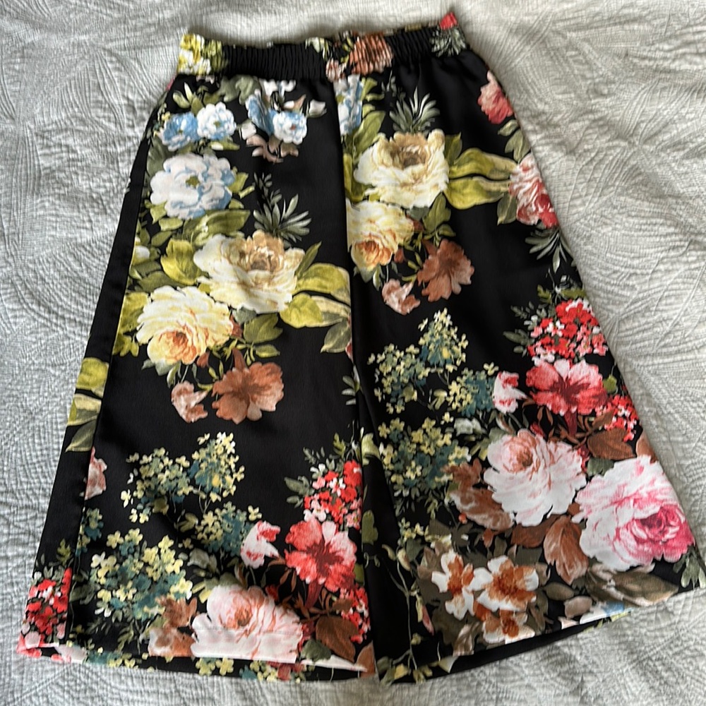 Dark floral mid length trouser.